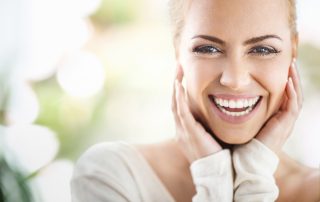 Woman smiling.